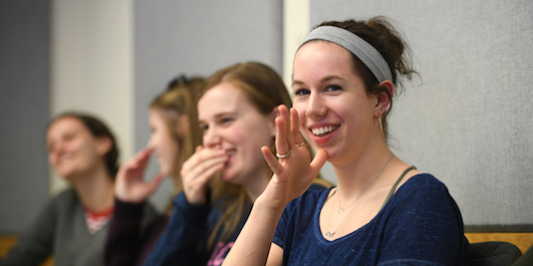 ASL students enjoy a funny moment in class.
