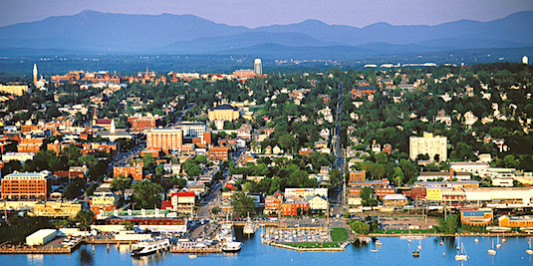 Aerial view of Burlington and the mountains of Vermont. Aerial view of Burlington and the mountains of Vermont.