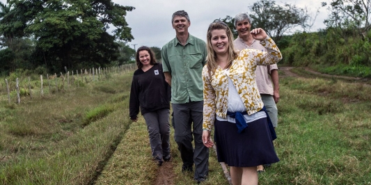 Gund Fellows walking a field