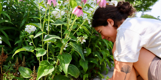 student working in garden