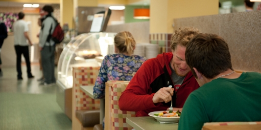 students eating in Redstone Unlimited dining hall