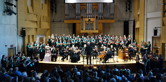 UVM Chorus performing on stage