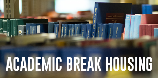 Picture of library books with words Academic Break Housing in white