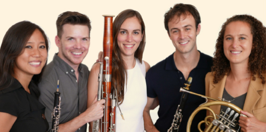 The five members of Windsync pose with their instruments