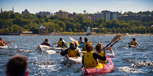 students kayaking on lake champlain
