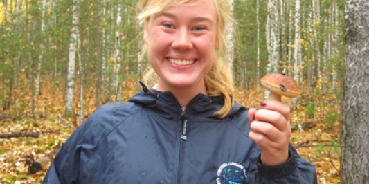Kirsti Dahly in Siberia picking mushrooms