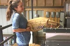 adding grain to machine