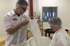students wearing lab coats
