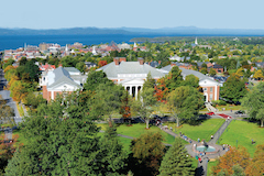 Aerial view of UVM campus, Burlington, Lake Champlain, and the Adirondak Mountains.