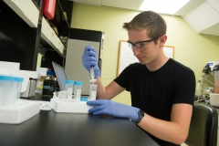 Student with a pipette