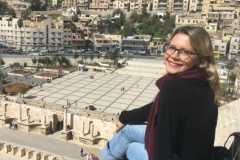 Charis Jones with a overhead view of a Middle Eastern city