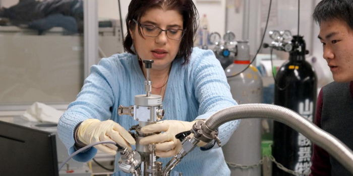 person in lab with materials