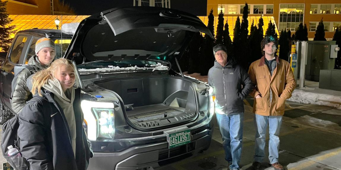 Students inspecting new Ford Lightning electric truck