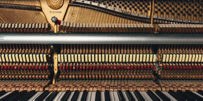 Inner workings of a baby grand piano