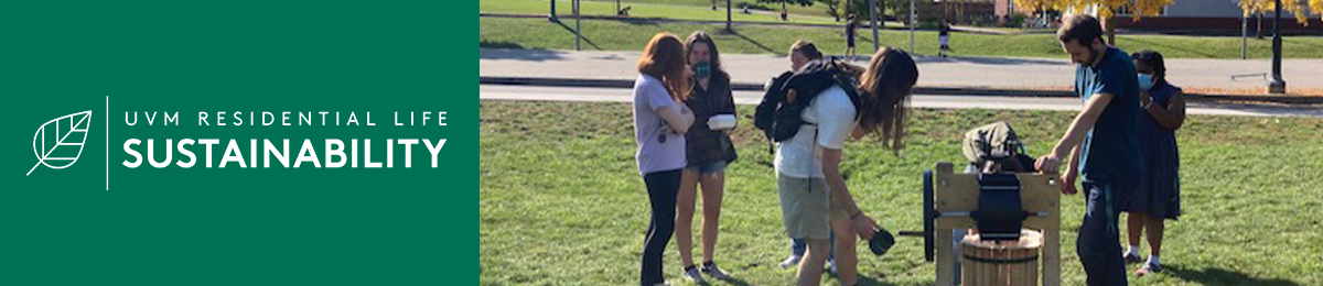 Students engaging in a cider press event