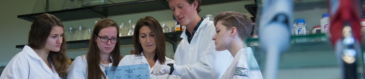 students and faculty in lab