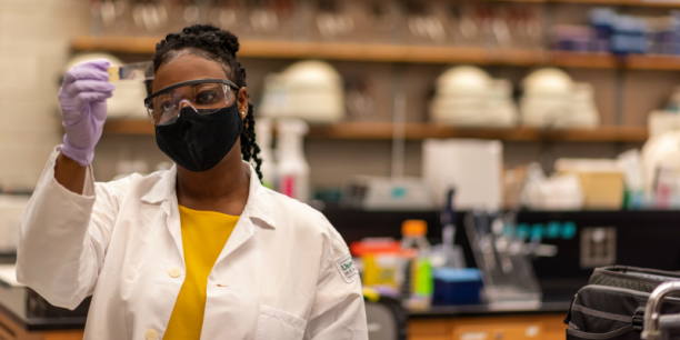 Medical laboratory science student looks at a biological specimen in a laboratory at UVM.