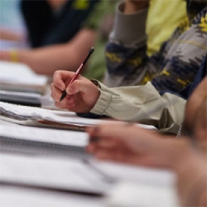 Students put their pens to paper.