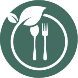 white spoon and fork circled by a leaf graphic on a green background