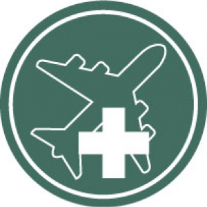 airplane and medical cross on green background