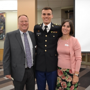 Connor MacDonald ('21) and his parents pose for a photo at the Alumni Reception.