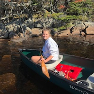 Charlotte Uden in a canoe