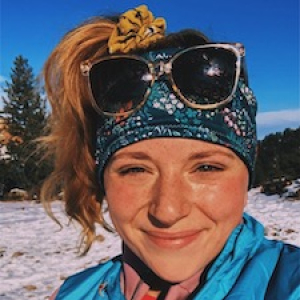 Greta Savitsky with blue sky