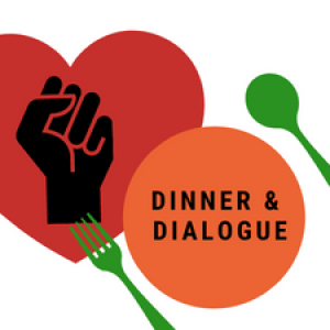 Orange circle dinner plate and green utensils and a red heart with a black fist inside