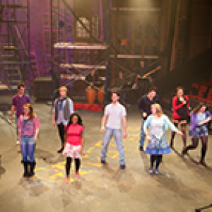 Actors on their spots in a scene during a Godspell performance at the Royall Tyler Theatre