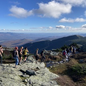 Students hiking down from Mount Mansfield summit
