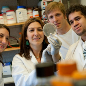 Paula Deming with students in lab