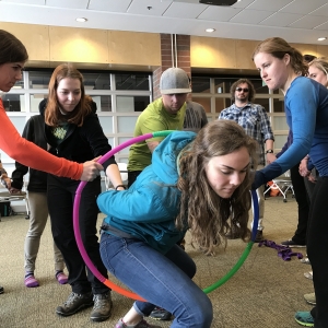 Climbing through a hoop