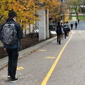 campus pathway with walkers