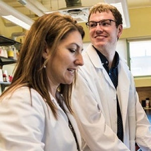 Professor Paula Deming and senior Tyler Hogan in the lab
