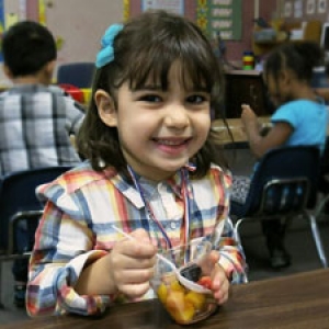 Girl with fruit