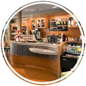 Henderson's Cafe counter with coffee and pastries ready for order