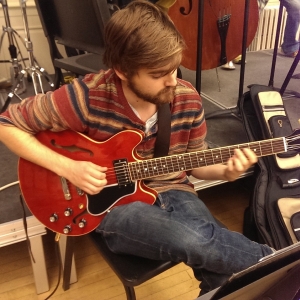 student playing guitar