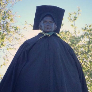Statue dressed in cap and gown