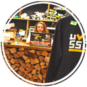 a student sits at a desk in the ski and snowboard clubhaus