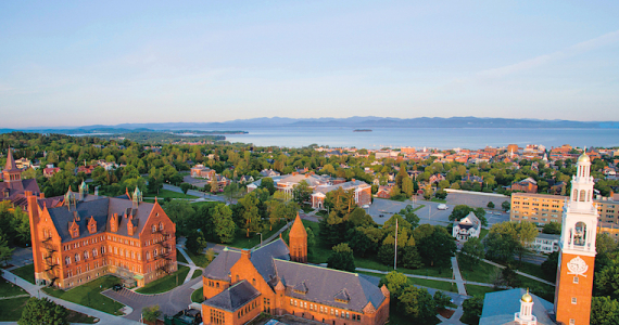 Aerial view of UVM campus, Lake Champlain, and the Adirondack Mountains in the distance