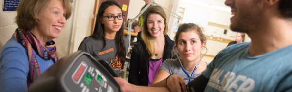 UVM DPT students with faculty in lab