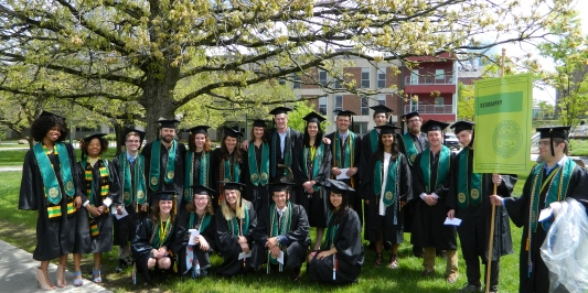 Geography Honors award winners of 2020 under a tree on the green