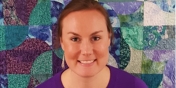 Nurse Abby is smiling in her office