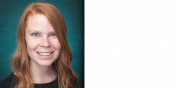 Smiling redheaded Katie against a deep bluish green background