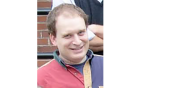 Matt Weiner smiling for the camera in and outdoor setting
