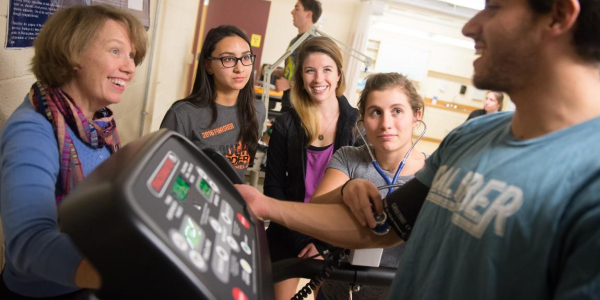 UVM DPT students with faculty in lab