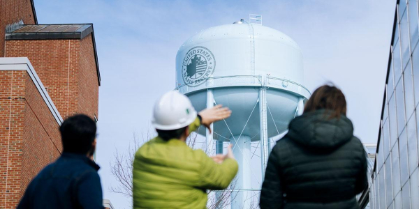 The UVM water tower with a seal reading "United States Maple Reserve"