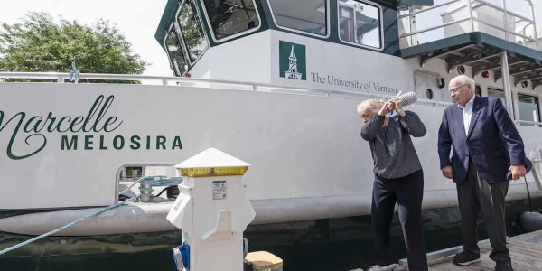 Marcelle Leahy and former U.S. Senator Patrick Leahy, prepare to christen UVM's new research vessel, the Marcelle Melosira.