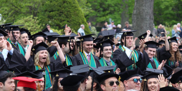 GSB soon-to-be graduates stand at the 222nd University of Vermont Commencement Ceremony