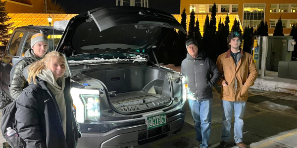 Students inspecting new Ford Lightning electric truck